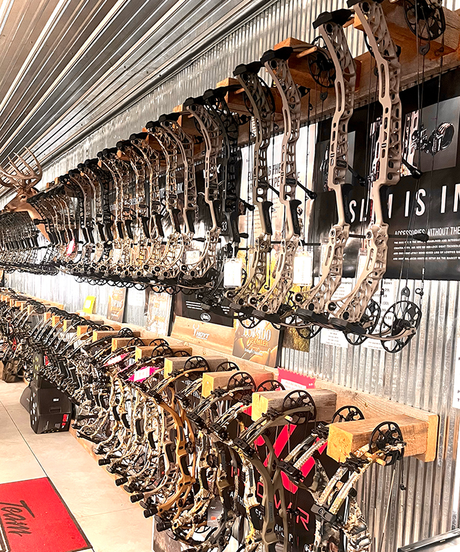 Wall of bows at Beimert Outdoors